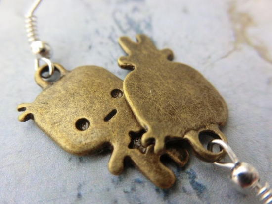 Preview: Figur Ohrringe Männchen bronzefarben Stern Star